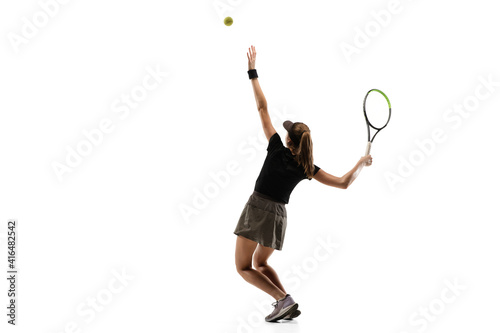 Walk over. Young caucasian professional sportswoman playing tennis isolated on white background. Training, practicing in motion, action. Power and energy. Movement, ad, sport, healthy lifestyle © master1305