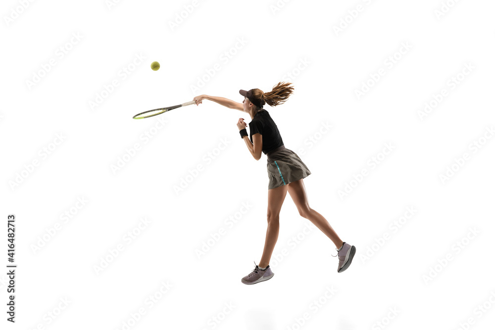 Obraz premium Walk over. Young caucasian professional sportswoman playing tennis isolated on white background. Training, practicing in motion, action. Power and energy. Movement, ad, sport, healthy lifestyle