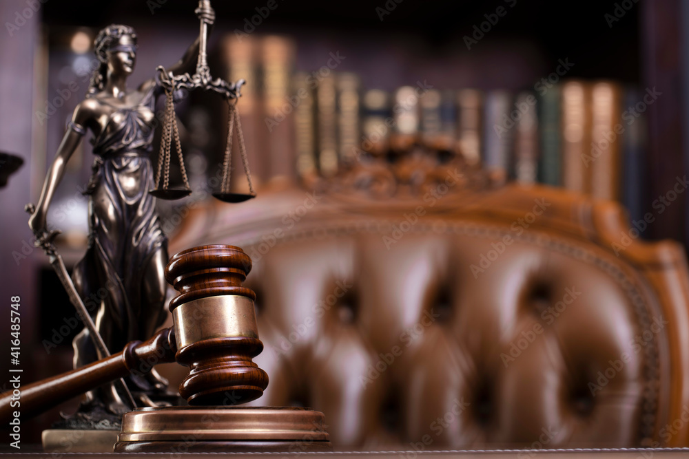 Law theme. Judge chamber. Judge’s gavel, Themis sculpture and