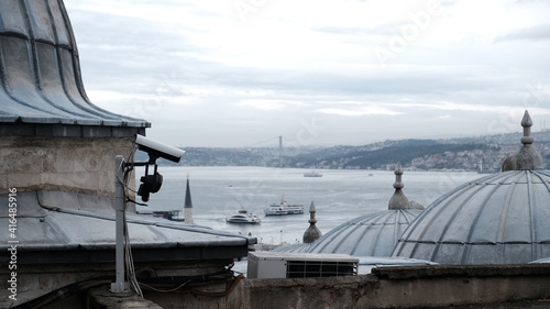 Modern Online Security CCTV camera surveillance system for safety life or asset. Aerial view of Karakoy quarter on bank of Golden Horn bay from side of Suleymaniye Mosque in Fatih district, Istanbul.