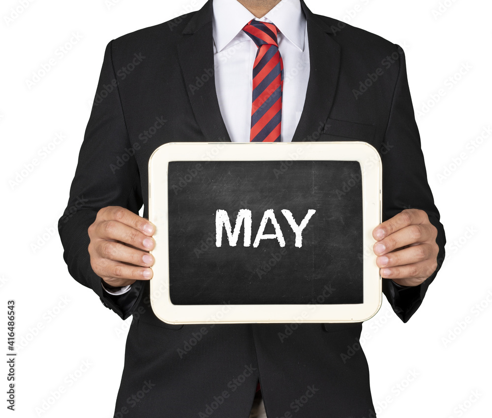 A Businessman holding slate mini blackboard with message May A Businessman holding slate mini blackboard with message May