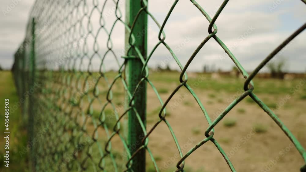 Border fence. Private territory. Closed area. Metal mesh. Protection from refugees. Prison net. Life in captivity. The escape. Border fence. Private territory. Closed area. Metal mesh. Protection from refugees. Prison net. Life in captivity. The escape.