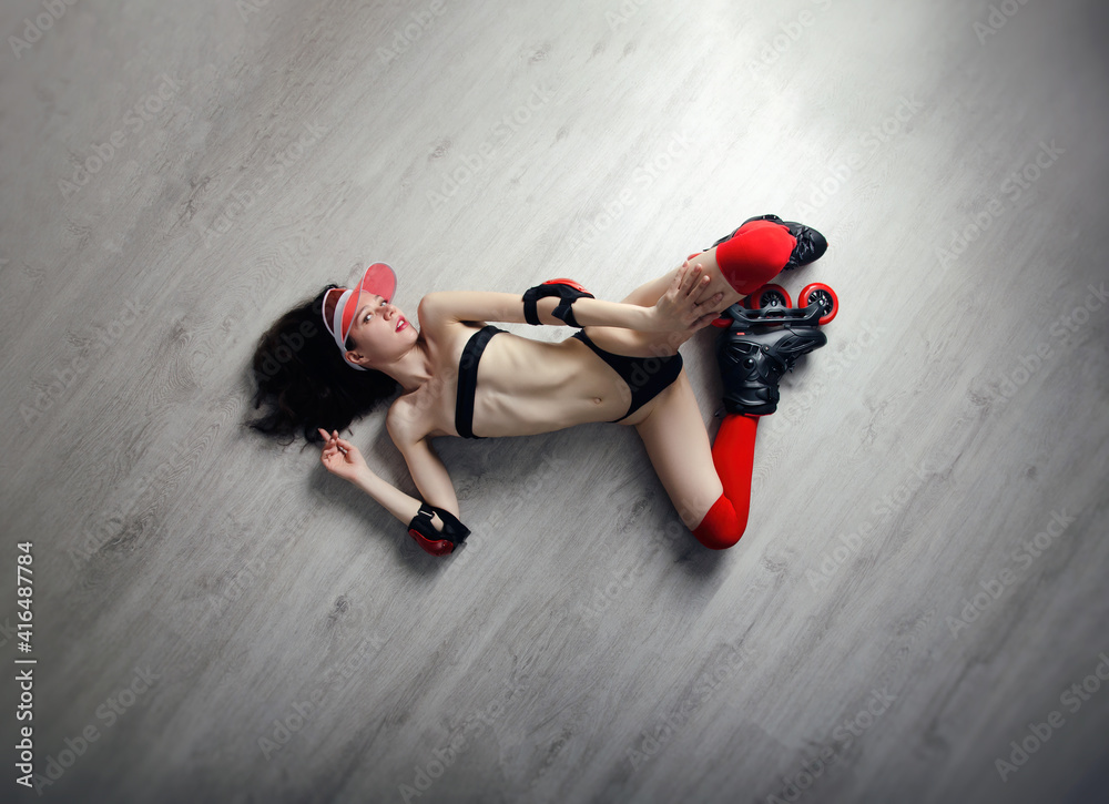 naked slender woman in roller skates red and black color scheme Stock Photo  | Adobe Stock