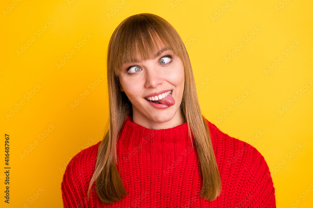 Photo of blond nice optimistic lady tongue out crossed eyes wear red sweater isolated on bright yellow color background Photo of blond nice optimistic lady tongue out crossed eyes wear red sweater isolated on bright yellow color background
