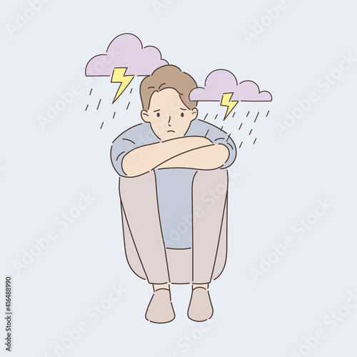 The young man was feeling down and depressed as if it was a storm and rain. Mental health concept. Hand draw style. Vector illustration.