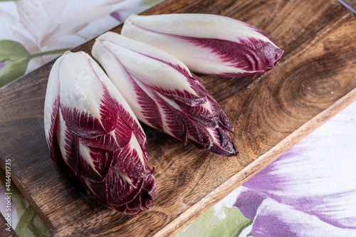 Healthy food Belgian endive red chicory lof lettuce close up photo