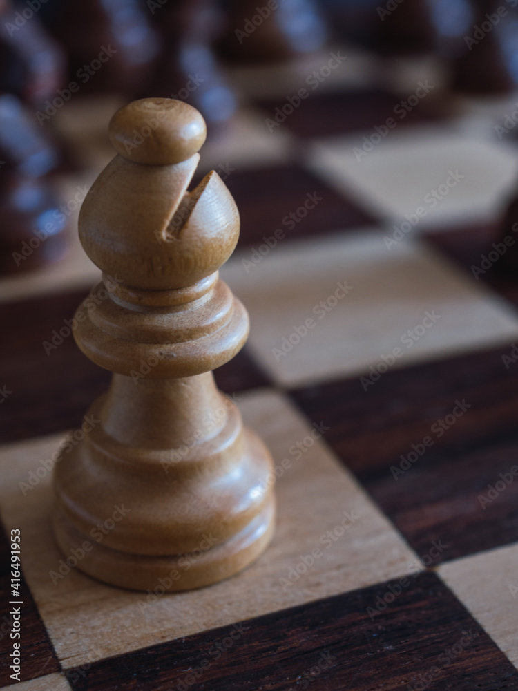 Close up wooden bishop piece with copy space Close up wooden bishop piece with copy space