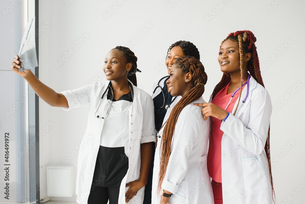 group of young african medical workers on white background group of young african medical workers on white background