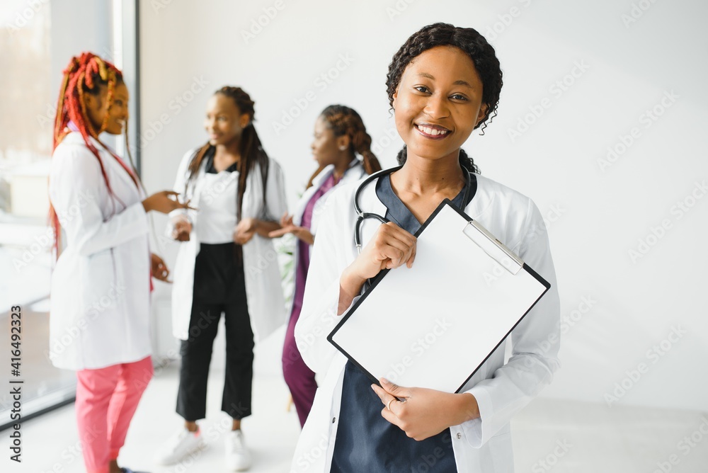 group of young african medical workers on white background group of young african medical workers on white background