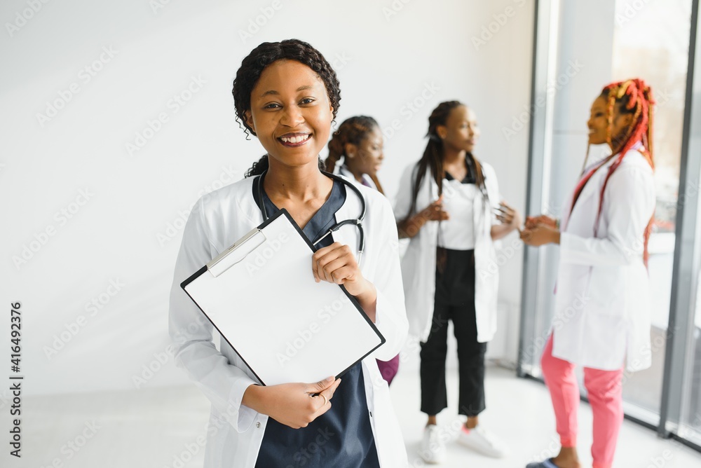 group of young african medical workers on white background group of young african medical workers on white background