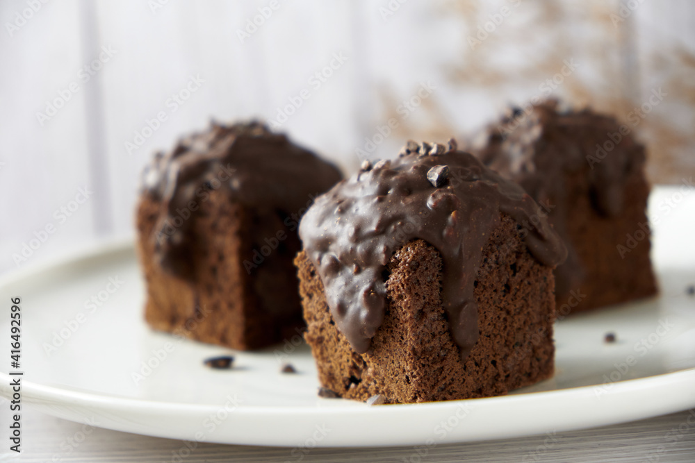 Chocolate Cube pound cake set on cafe table.