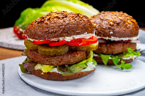 Grilled plant based, meat free vega burgers close up