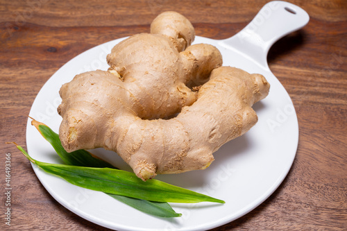 Fresh ginger rhizome root used in traditional medicines and for flavoring meals worldwide.