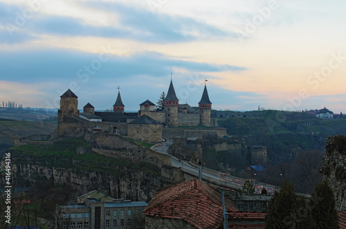 Wallpaper Mural Beautiful landscape photo of medieval Kamianets-Podilskyi castle and Turkish Bridge. Famous touristic place and romantic travel destination in the city. Landscape during the winter season, no snow Torontodigital.ca
