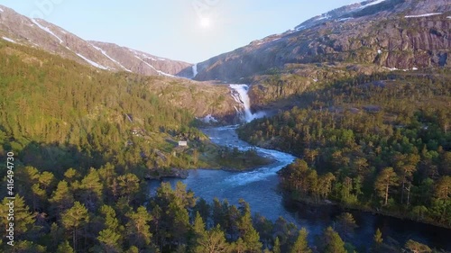 Nyastolfossen falls, waterfall in Husedalen valley, Kinsarvik, Norway photo