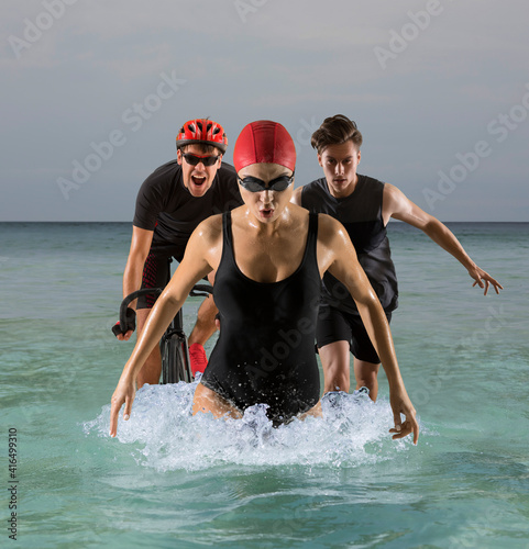 Obraz na płótnie Triathlon sport collage. Man, woman running, swimming, biking