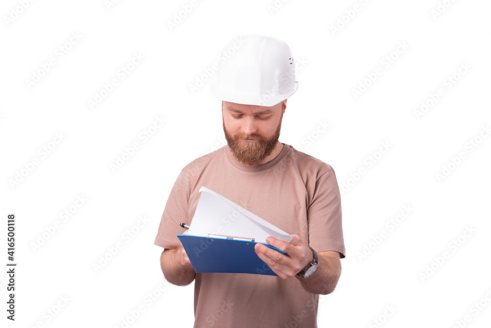 Photo of smiling architect looking at sketches over white background Photo of smiling architect looking at sketches over white background