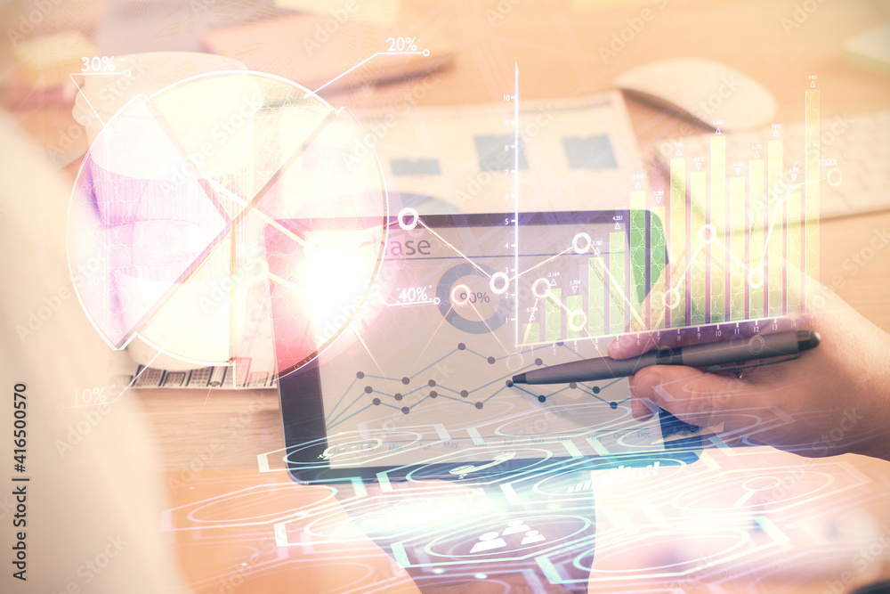 Double exposure of man's hands holding and using a phone and financial chart drawing. Market analysis concept. Double exposure of man's hands holding and using a phone and financial chart drawing. Market analysis concept.