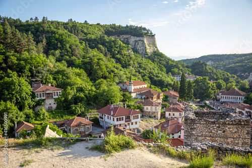 MELNIK, BULGARIA - JUNE 01, 2018: Typical street and old houses in historical town of Melnik, Blagoevgrad region, Bulgaria.