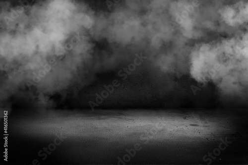 Texture dark concentrate floor with mist or fog. Black, dark and gray abstract cement wall and studio room
