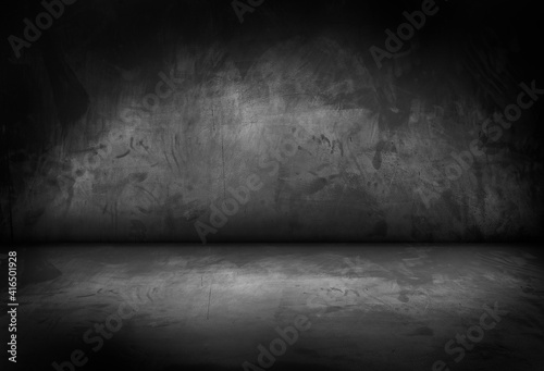 Black, dark and gray abstract cement wall and studio room , interior texture for display products. Room black floor is made of dark plaster.