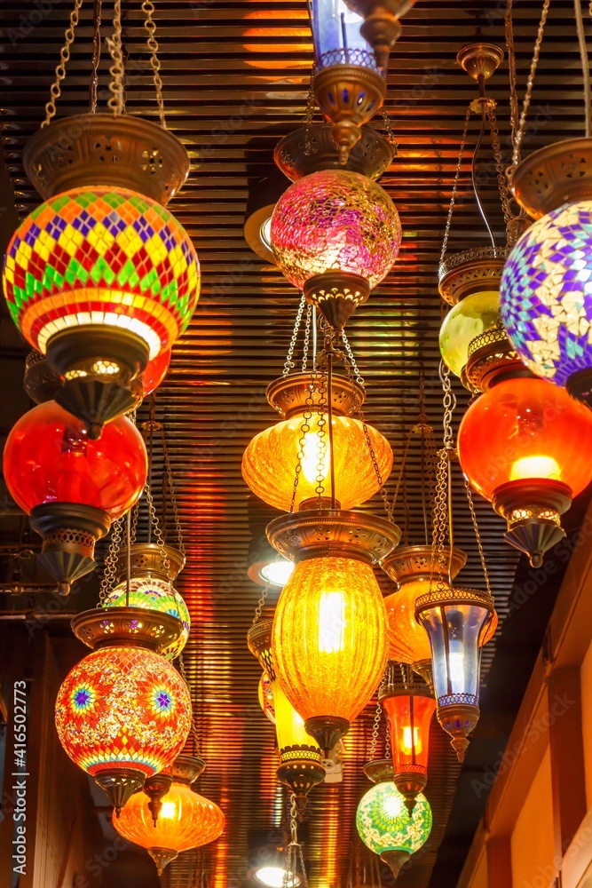 Turkish mosaic lamp oriental traditional light. Mosaic of colored glass. Lit in the evening, creating a cozy atmosphere