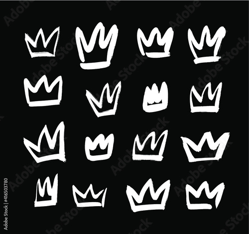 Vector art illustration grunge crown. Set of hand drawn paint object for design. Black and white Graffiti background. Abstract brush drawing