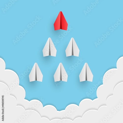 Individual red leader paper plane lead other. Business and leadership concept