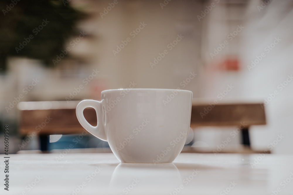 coffee on glass table outdoors