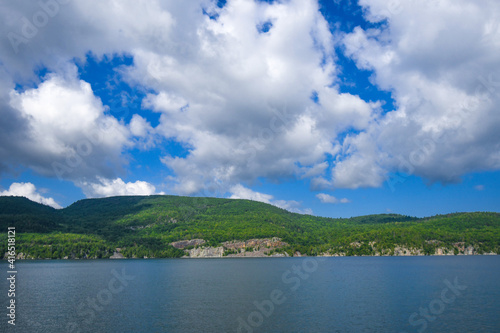 Adirondack Mountains on the shore of Lake Champlain seen from a boat