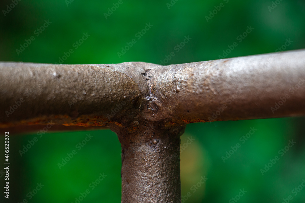 Rust damage paint and corrosion flange on the roof tank. plumbing iron pipes, industry, manufacture of iron pipes. oxidation rust full of oil pipeline, closeup of photo
Rust damage paint and corrosion flange on the roof tank. plumbing iron pipes, industry, manufacture of iron pipes. oxidation rust full of oil pipeline, closeup of photo