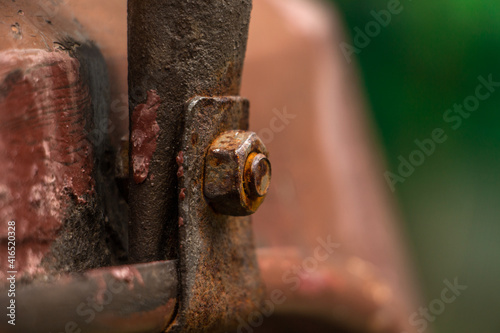 Fototapeta Naklejka Na Ścianę i Meble -  Rust damage paint and corrosion flange on the roof tank. plumbing iron pipes, industry, manufacture of iron pipes. oxidation rust full of oil pipeline, closeup of photo


