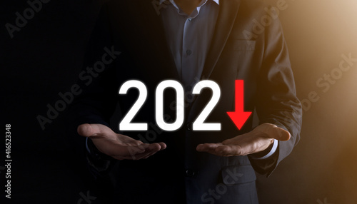Plan business negative growth in year 2021 concept. Businessman plan and increase of negative indicators in his business, decline down business concepts.