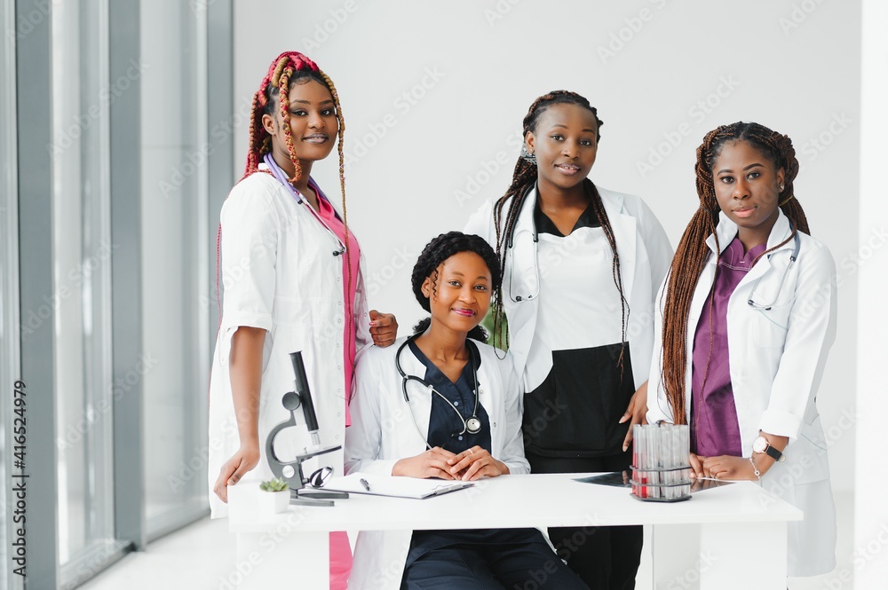Fototapeta premium African-American black doctor woman and medical group