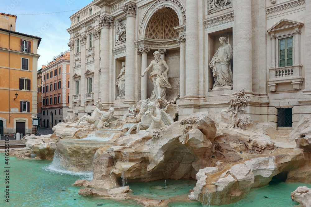 View of the Trevi Fountain in Rome and Palazzo Poli, one of the most visited tourist sites in Rome, Italy