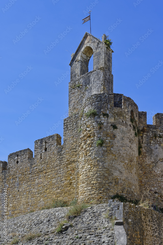 Small arched window and cross above the South portal, Castle and Convent of the Order of Christ, Tomar, Santarem district, Portugal