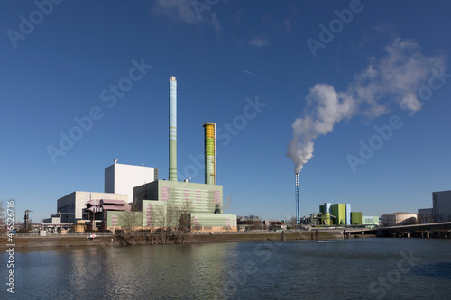 power station industry area with silos and tanks at the rhine harbor in Mainz-Mombach  Germany.