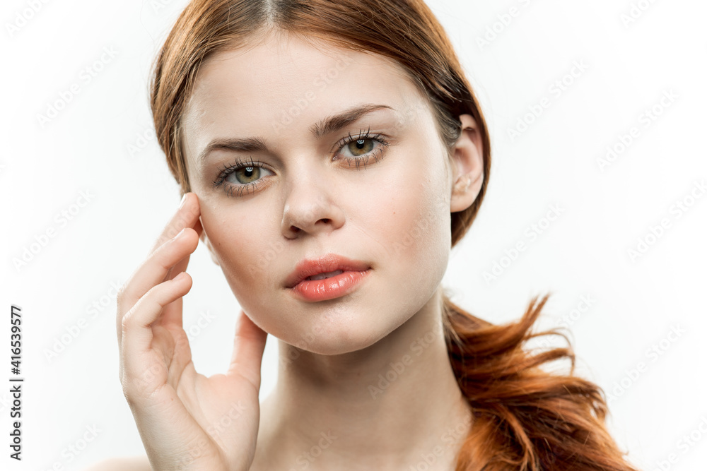 pretty woman with bare shoulders holds hand near face emotions cosmetics luxury pretty woman with bare shoulders holds hand near face emotions cosmetics luxury