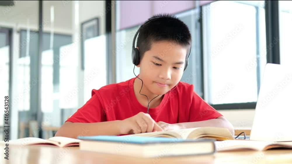 asian boy student studying learning lesson online. remote meeting distance education at home asian boy student studying learning lesson online. remote meeting distance education at home
