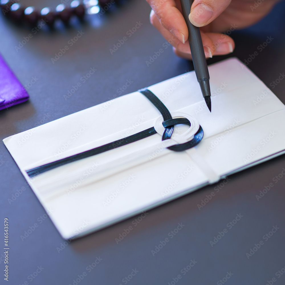 香典袋 筆ペンで書く 葬儀のイメージ Stock Photo Adobe Stock