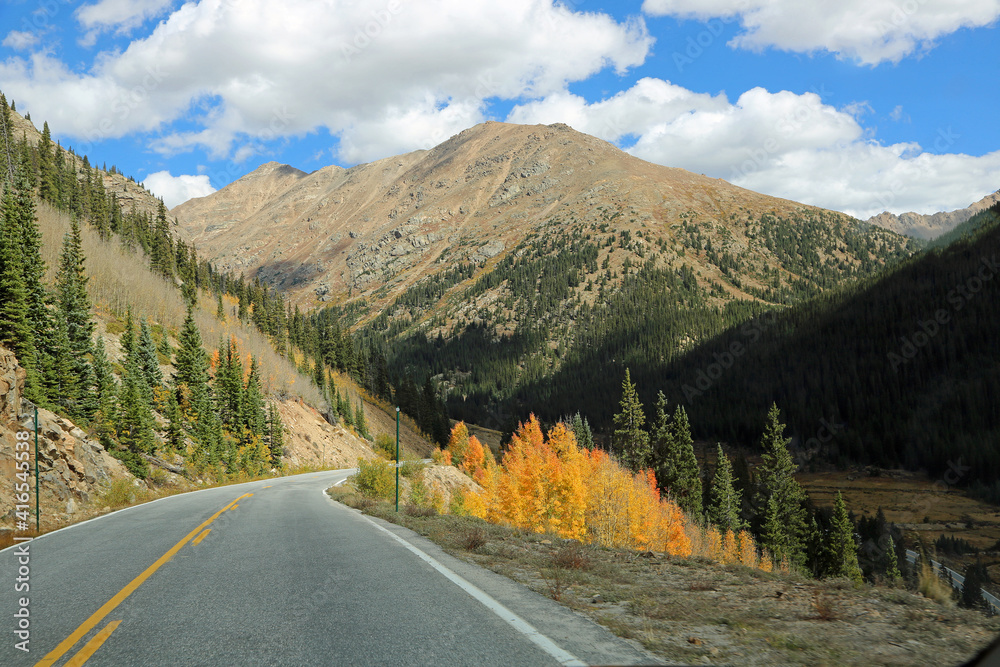 Scenic road in fall colors - Rocky Mountains, Colorado