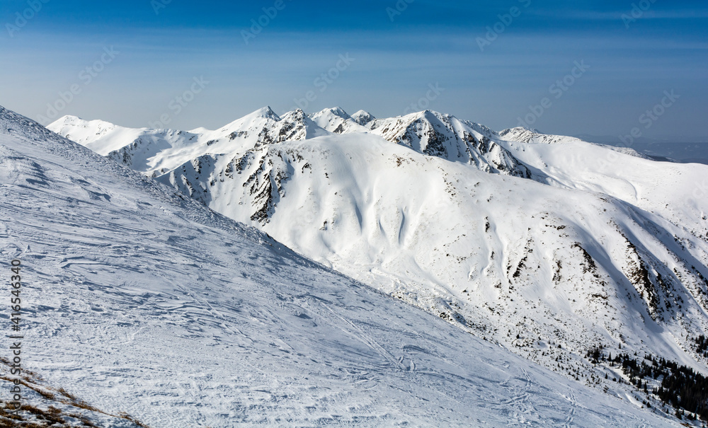 Mountain landscape in winter scenery on a beautiful sunny day. Western Tatras.