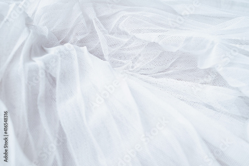 White colored tulle fabric texture. Textile background