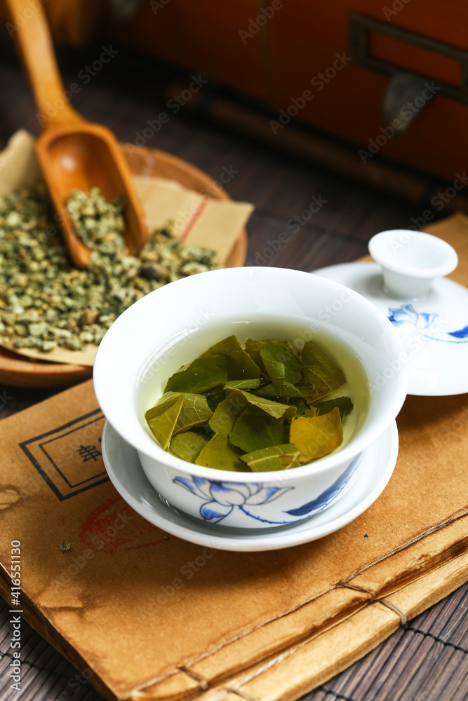 Lotus leaf tea in blue and white porcelain covered bowl Lotus leaf tea in blue and white porcelain covered bowl