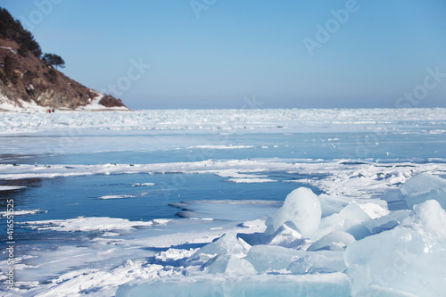 Ice floes near Listvyanka village. Baikal lake winter landscape
