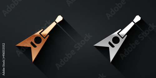 Gold and silver Electric bass guitar icon isolated on black background. Long shadow style. Vector.