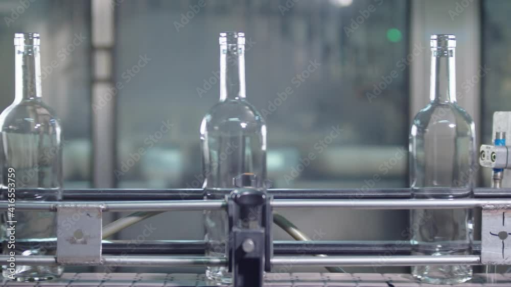 Wine production factory. Bottling production line. Wine production factory. Bottling production line.