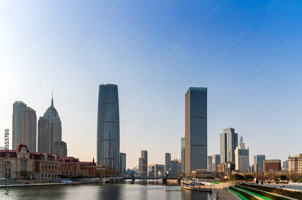 waterfront downtown skyline with Tianjin high-rise building cityscape at Haihe riverside, Tianjin city, China waterfront downtown skyline with Tianjin high-rise building cityscape at Haihe riverside, Tianjin city, China