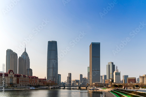 waterfront downtown skyline with Tianjin high-rise building cityscape at Haihe riverside, Tianjin city, China