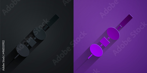 Paper cut Olive and cheese on chopstick icon isolated on black on purple background. Canape, tapas with cheese and olive. Paper art style. Vector.